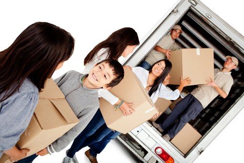 Student removals team loading boxes and furniture in Harrow
