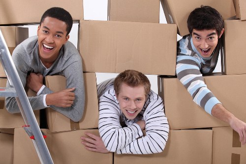 Boxes and personal belongings prepared for a student move in Harrow
