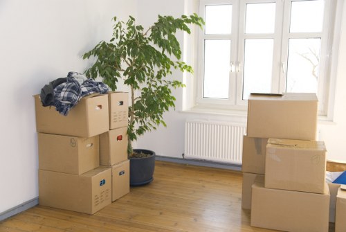 Removal team supporting a house move in Harrow with boxes and furniture
