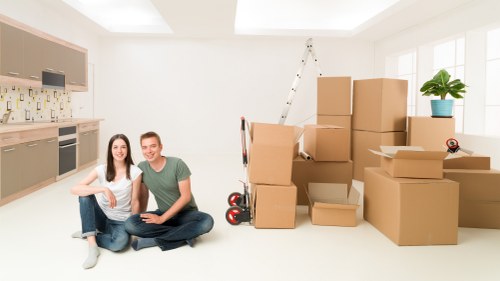 Moving boxes and household items being prepared for Harrow relocation