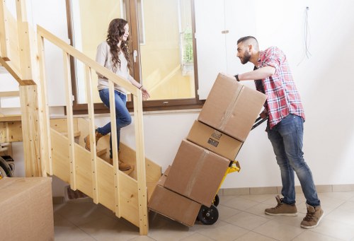 Packed boxes organised for a residential move in Harrow