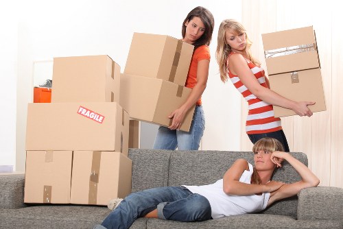 Worker checking a load and using safe manual handling practices